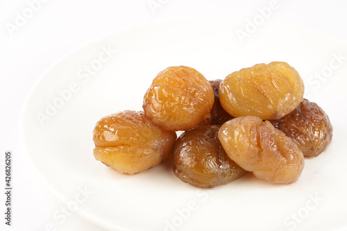 Delicious Turkish candied chestnut  ( Kestane Sekeri ) or marron glace. Isolated on white background.