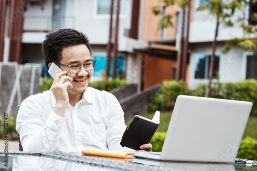 Business Concept - Young Business man woking on Financial plan. Strategy Analysis photo