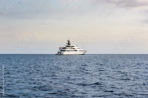 Private ocean-going yacht at sea at anchor. © German S