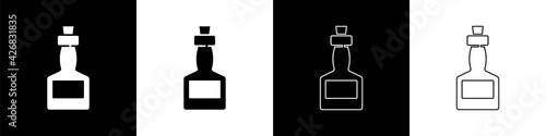 Set Tabasco sauce icon isolated on black and white background. Chili cayenne spicy pepper sauce. Vector