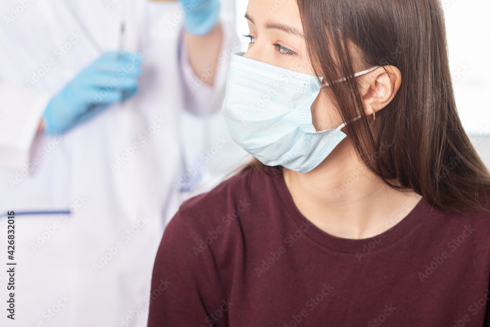 complications and negative consequences of vaccination, a teenage girl is afraid of an injection of a vaccine due to allergies complications and negative consequences of vaccination, a teenage girl is afraid of an injection of a vaccine due to allergies