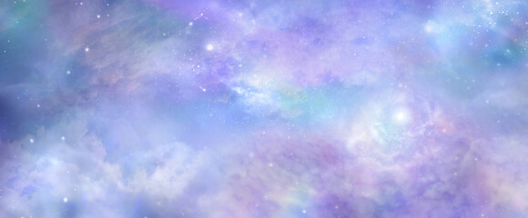 Beautiful heavens above celestial concept background banner - beautiful blue pink purple green lilac light filled heavenly ethereal cloud scape depicting the heavens above 
