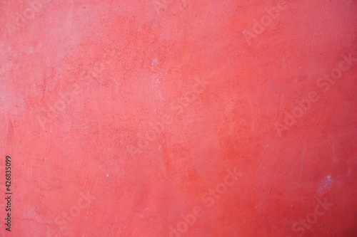 Cement wall in red paint for background and decoration