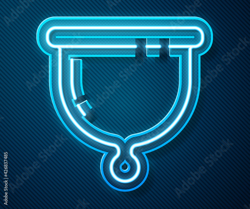 Glowing neon line Menstrual cup icon isolated on blue background. Feminine hygiene. Protection for woman in critical days. Vector
