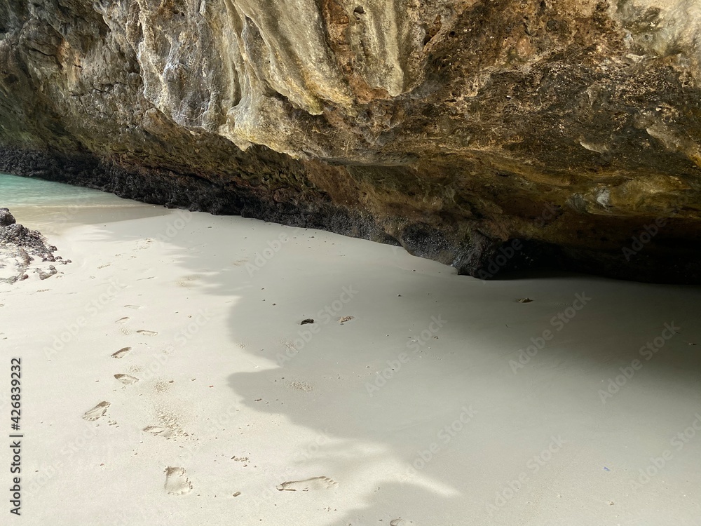 eroded cliff face on beach in thailand close up