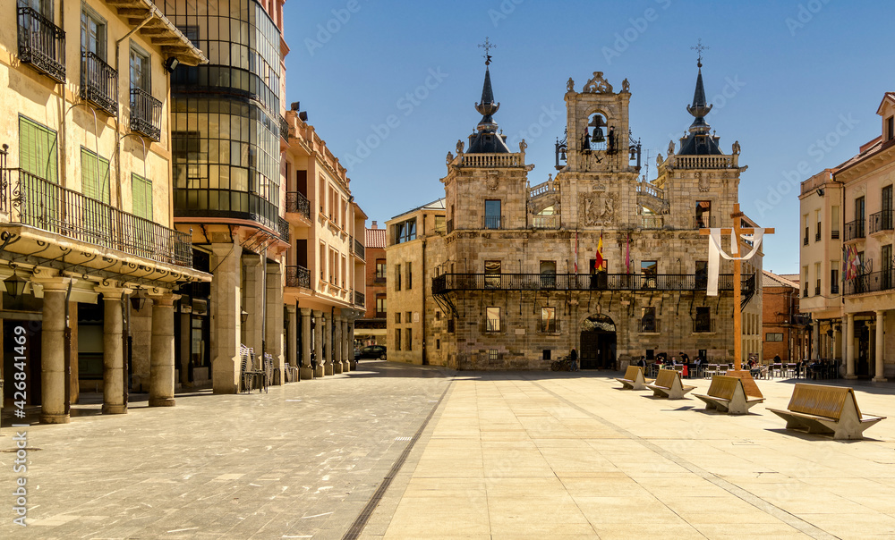 Cityscape of Astorga, Spain, with view of historic town hall building and main square.