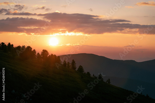 sunset mountains sun forest clouds sky