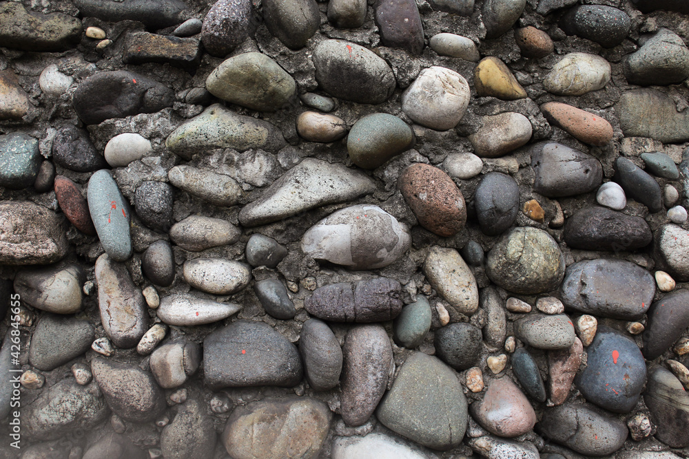 River stones natural textured background. Horizontal image