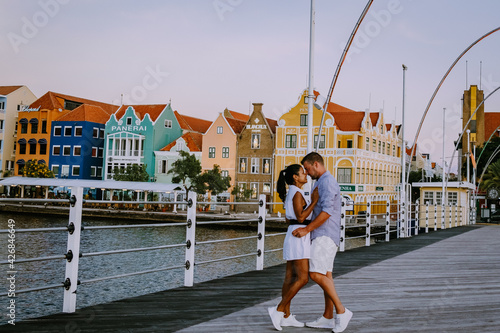 Foto Curacao Willemstad March 2021, sunset at the colorful city of Willemstad with pe