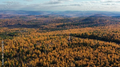 Eastern Siberia. Mountain taiga in autumn. Khamar-Daban ridge. Aerial view.