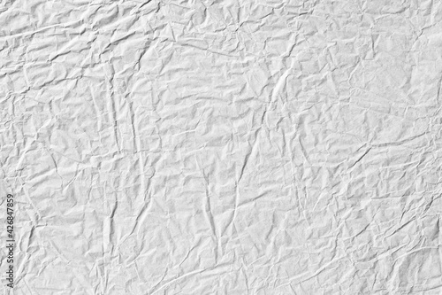 Light grey background crumpled paper texture