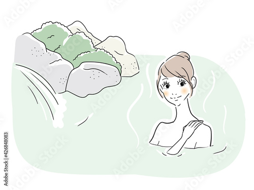温泉でくつろぐ女性