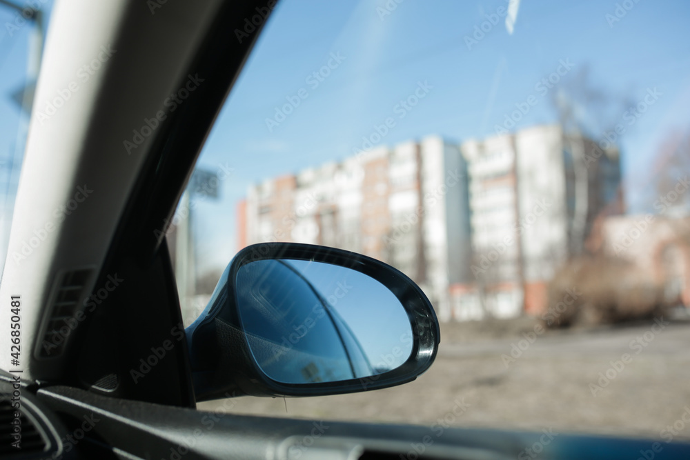 Rearview mirror, view from the car. Car door mirror. Rearview mirror, view from the car. Car door mirror.