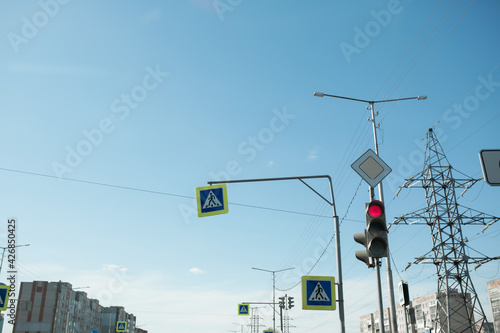 Traffic light and road signs.