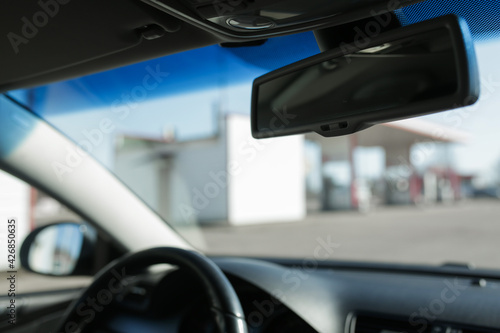 Rearview mirror inside the car.