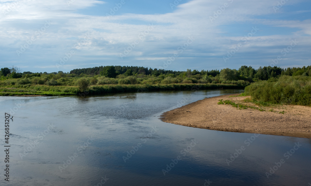Wide river Klyazma in the middle of Russia in the hot summer.