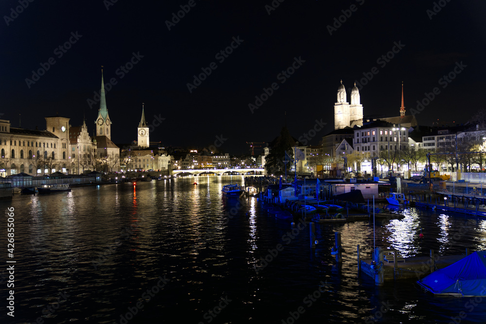 Illuminated old town city of Zurich by night. Photo taken April 9th, 2021, Zurich, Switzerland.