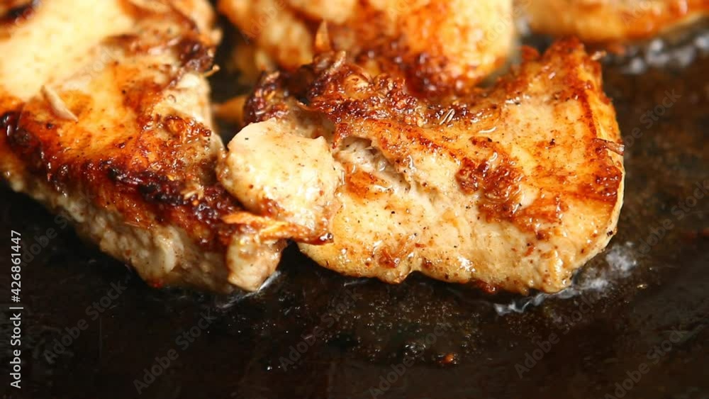 Frying chicken breast in pan, in door Chiangmai Thailand Frying chicken breast in pan, in door Chiangmai Thailand