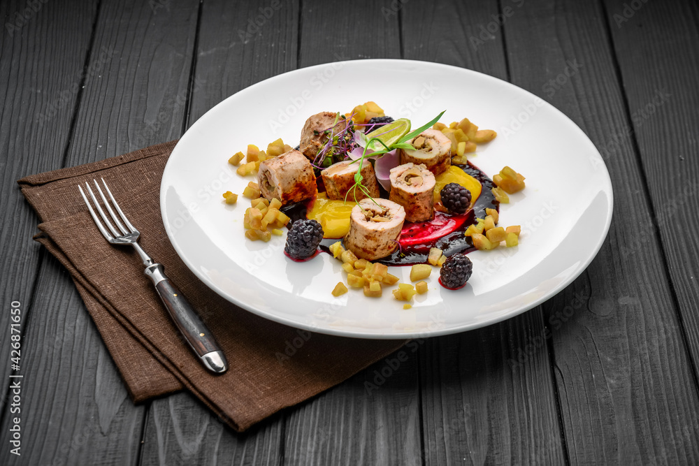 Roll stuffed with mushrooms and vegetables with berry sauce Roll stuffed with mushrooms and vegetables with berry sauce