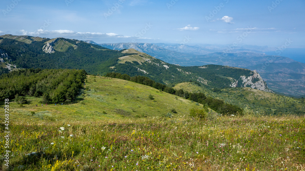 View of the surrounding mountains from the top of the Demerdzhi mountain range in Crimea.