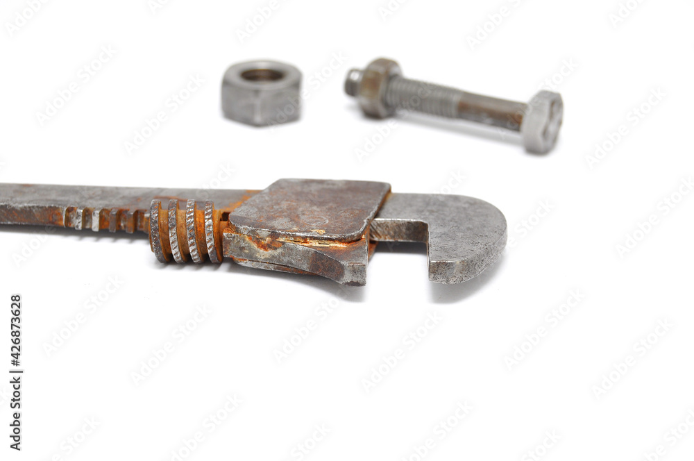 Wrenches covered in rust on white background close up
Wrenches covered in rust on white background close up