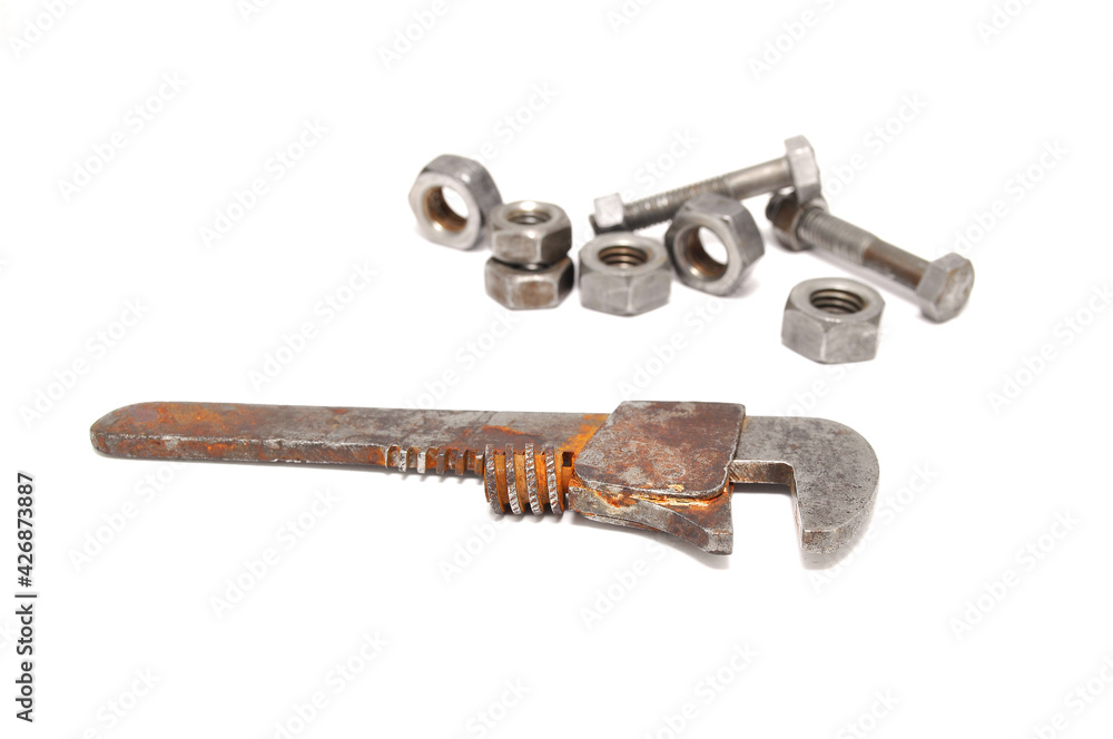 Wrenches covered in rust on white background close up
Wrenches covered in rust on white background close up