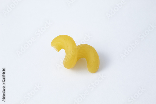 Cavatappi or cellentani pasta uncooked. Mac and chesse noodles