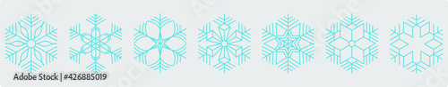 Hexagonal snowflakes icon set with blue geometric flakes on gray background 