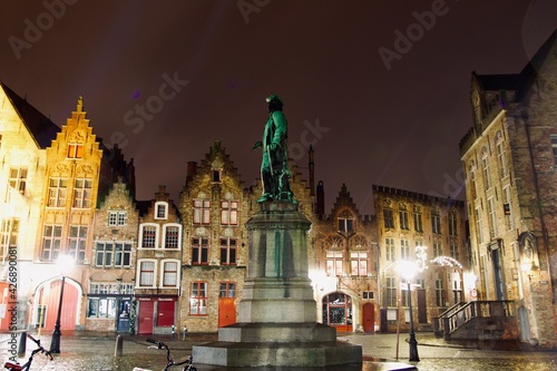 night view of a statue in Bruges, Belgium 