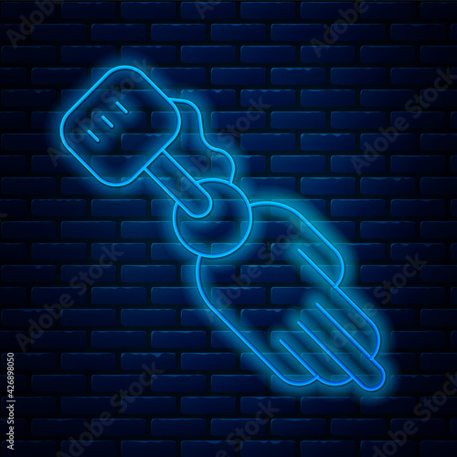 Glowing neon line Prosthesis hand icon isolated on brick wall background. Futuristic concept of bionic arm, robotic mechanical hand. Vector