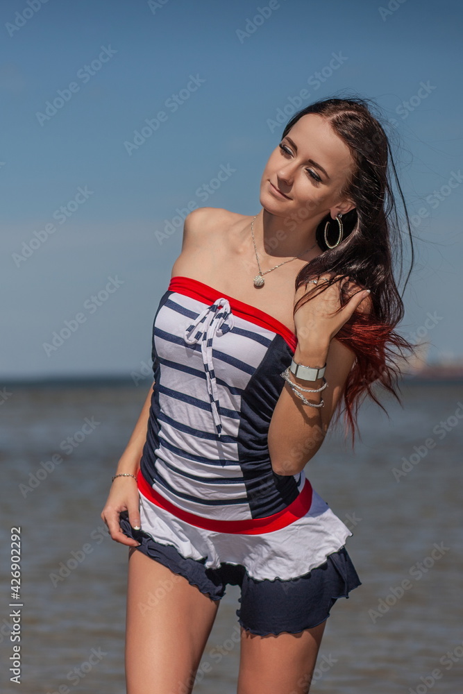 woman on the beach at sea