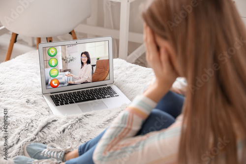 Stressed young woman asking...