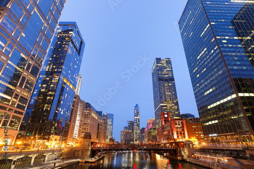 Chicago skyline after sunset showing Chicago downtown. Chicago, on Lake Michigan in Illinois, is among the largest cities in the U.S.  © jayyuan