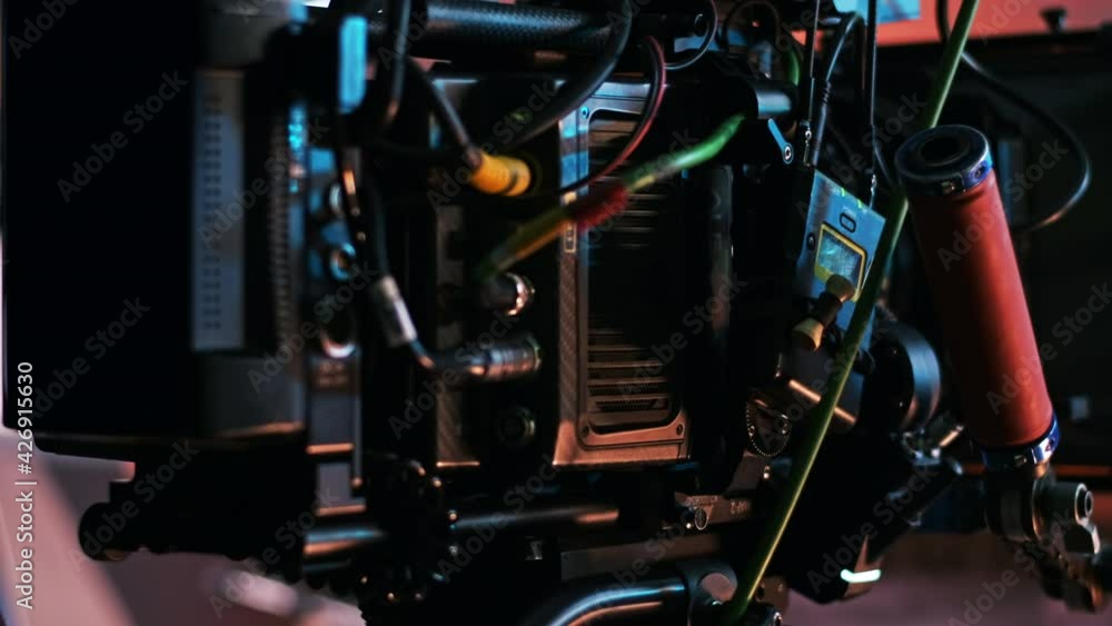 Professional video camera on the movie set with a lot of cables