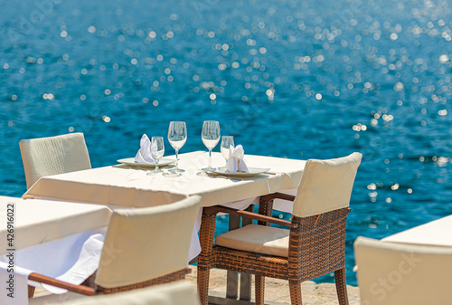 Street cafe at sea in Perast, Montenegro photo