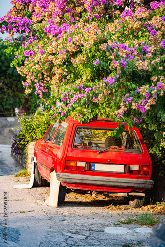 Retro car parked in street, Montenegro, Europe. photo