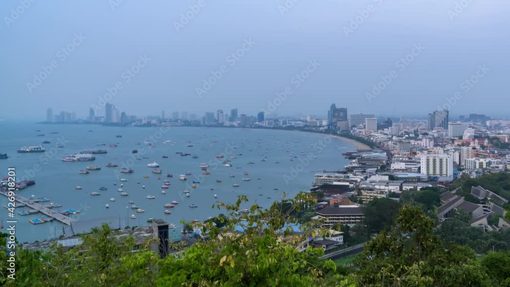 Pattaya bay and Bali Hai Pier, from Phra Tamnak Mountain viewpoint, day to night, Chonburi, Thailand; zoom in - Time Lapse Pattaya bay and Bali Hai Pier, from Phra Tamnak Mountain viewpoint, day to night, Chonburi, Thailand; zoom in - Time Lapse