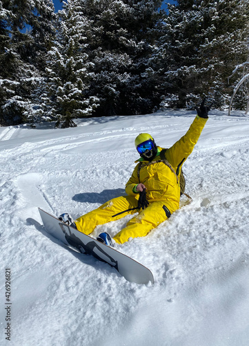 Man enjoying snowboarding at Vail ski resort at sunny day