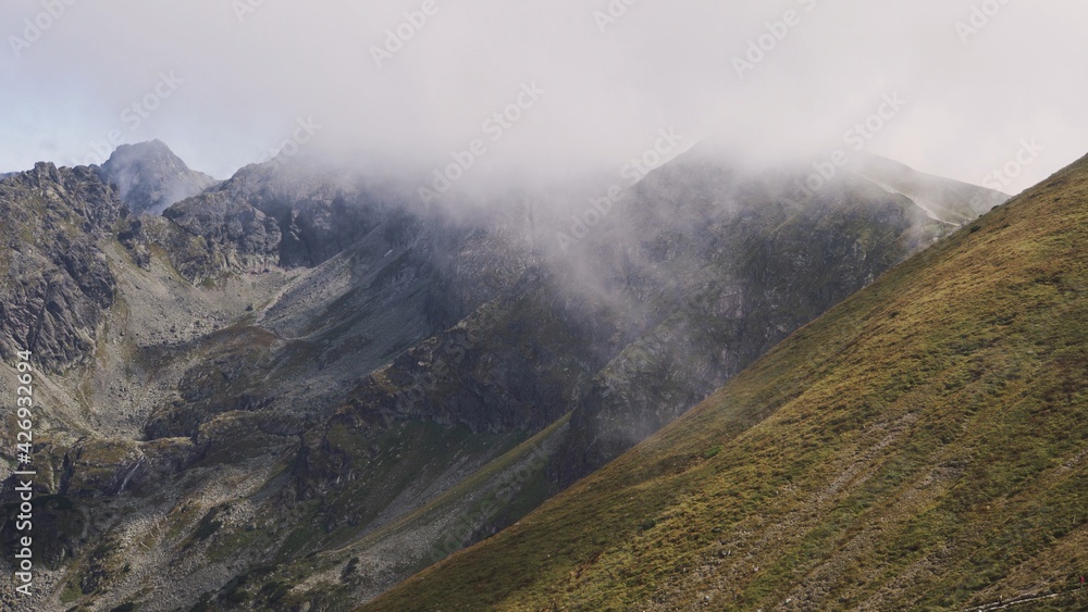 Koscielec from Kasprowy Wierch. Mountain covered in the clouds. High quality photo