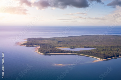 Aerial View from Airplane of Pacific Ocean West Coast. Colorful Sunrise Sky Art Render. Taken in Hesquiat Peninsula Provincial Park, North of Tofino, Vancouver Island, British Columbia, Canada. © edb3_16