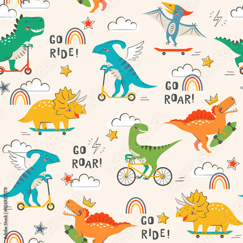 Seamless pattern with cute funny dinosaurs riding skateboard, scooter and bicycle on light background with clouds, rainbow, stars, lightning and hand drawn text.