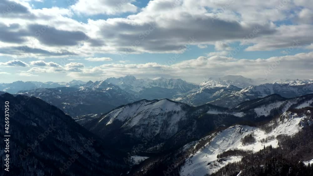 Mountain peaks and coniferous forest with spruces in winter. Kolashin, Montenegro Mountain peaks and coniferous forest with spruces in winter. Kolashin, Montenegro