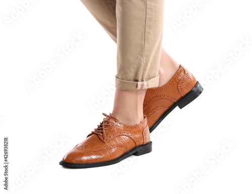 Woman in stylish shoes on white background, closeup