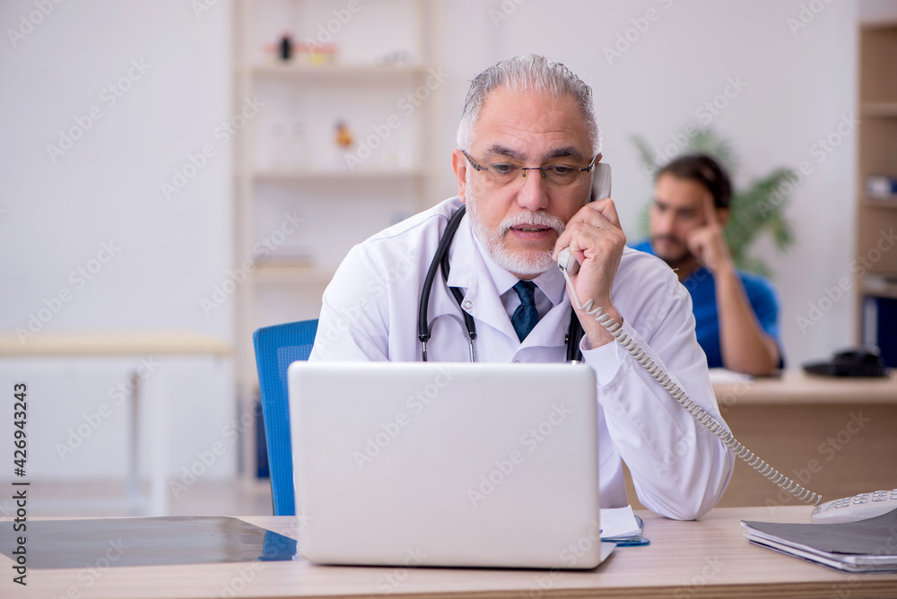 Two doctors working in the clinic Two doctors working in the clinic