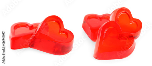 Sweet heart shaped jelly candies on white background. Banner design © New Africa