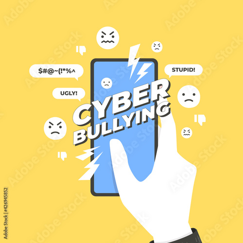 Cyber bullying concept. Hands holding smart phone with cyber bullying message.