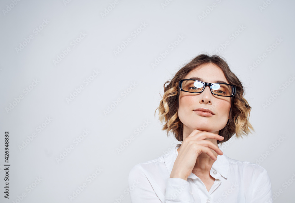 Woman wearing glasses with curly hair white shirt Copy Space Woman wearing glasses with curly hair white shirt Copy Space