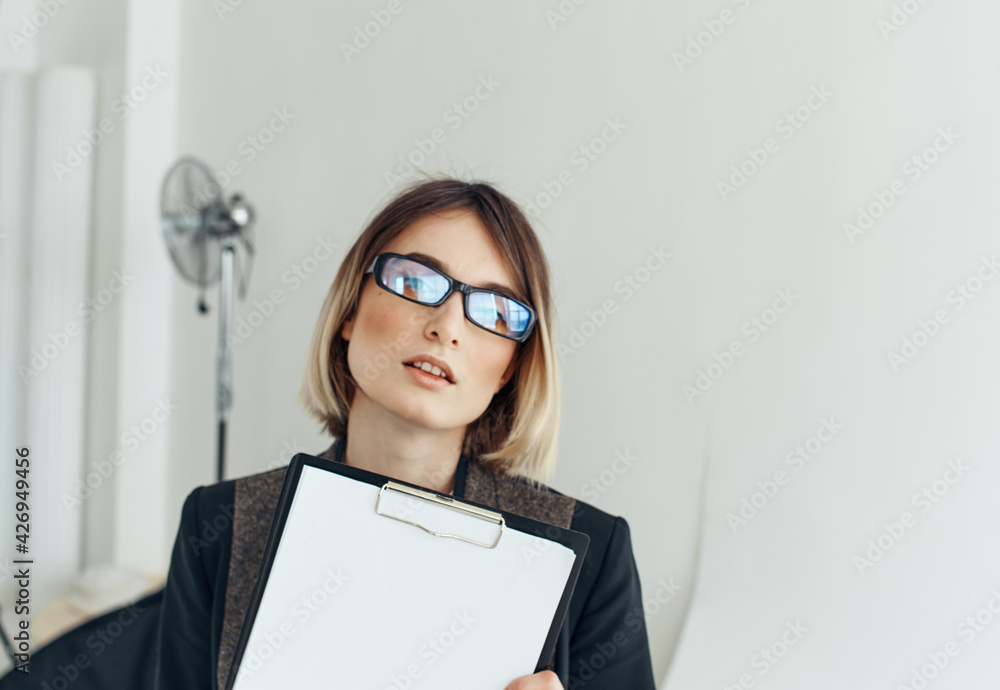 woman with documents running finance office model