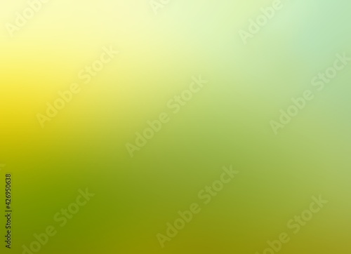 Warm light green empty background for spring or summer decor. Soft glow. 