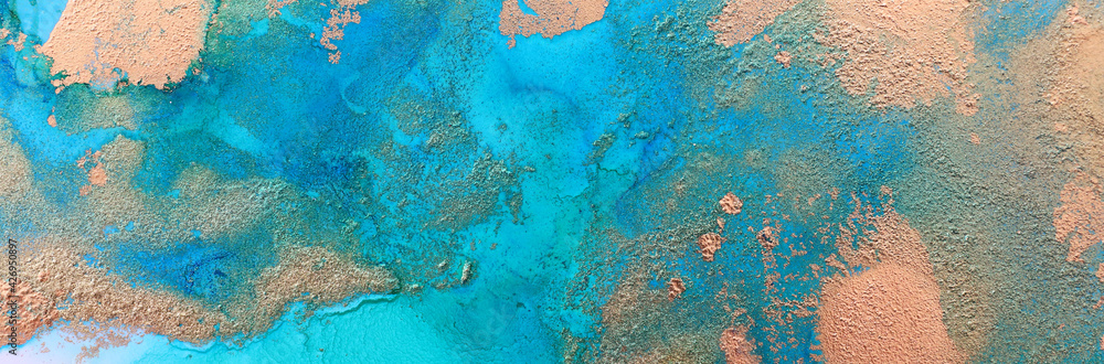 art photography of abstract fluid painting with alcohol ink, blue and gold colors art photography of abstract fluid painting with alcohol ink, blue and gold colors